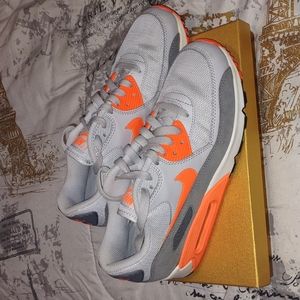 Gray and orange Nike Air Max